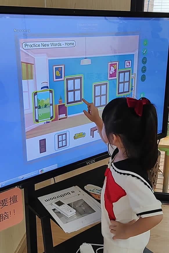 Digital display of ESL courseware on smartboard in an educational environment